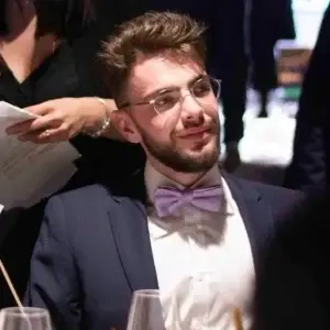 Portrait of Florian Scanu, Marketing Developer at iQrypto